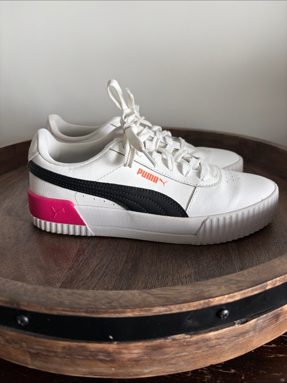 Puma White Low-Top Sneakers with Black Stripe and Pink Heel Accent